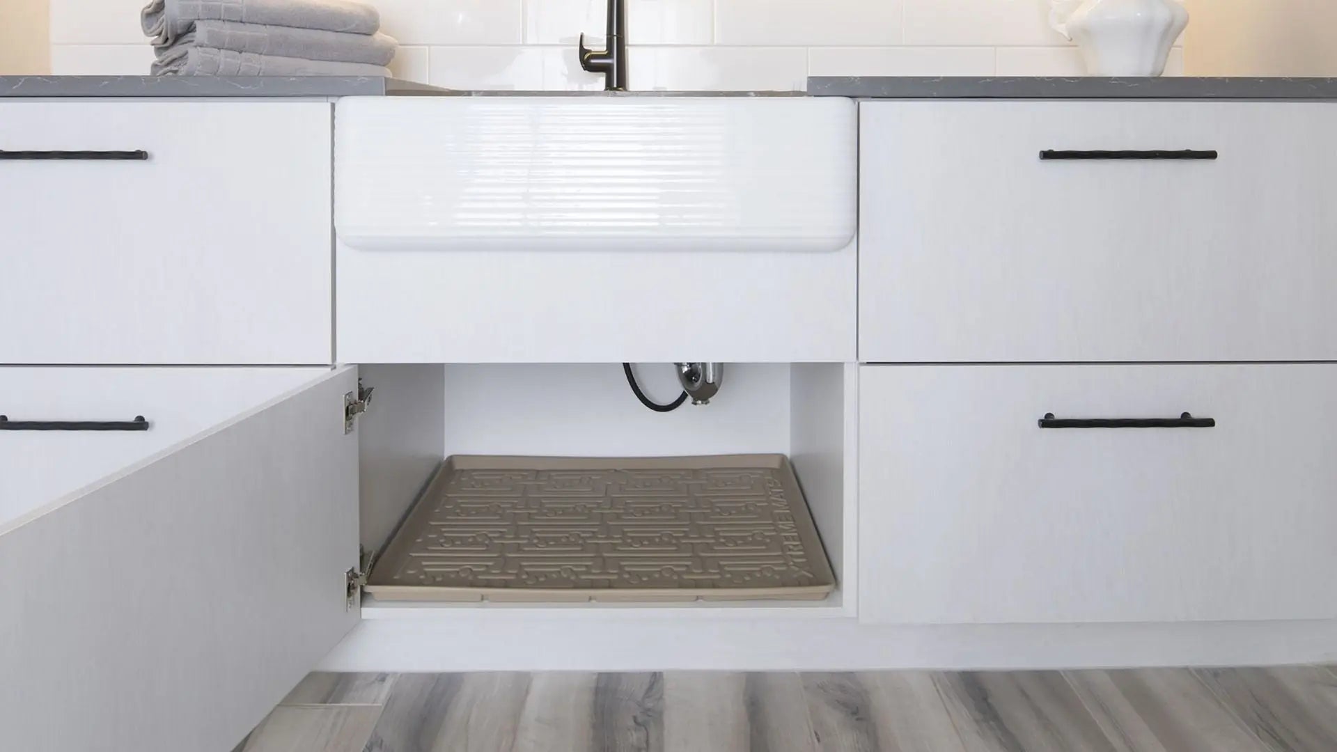 How Having an Under-Sink Mat Can Help With Water Leaking Damage ...